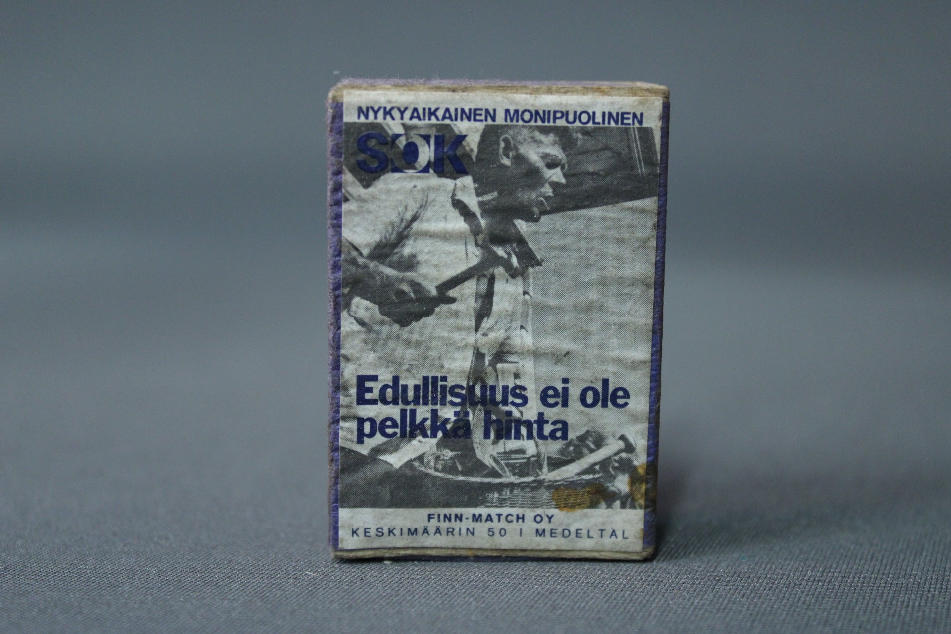 SOK tulitikkurasia, työntekoa korostava grafiikka