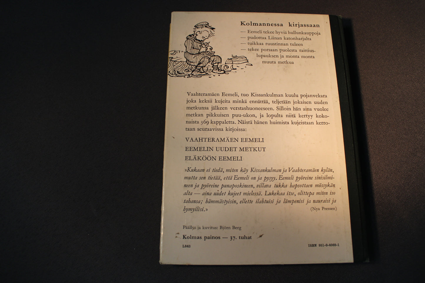 Eläköön Eemeli -kirjan takakansi ja selkä, kovakantinen