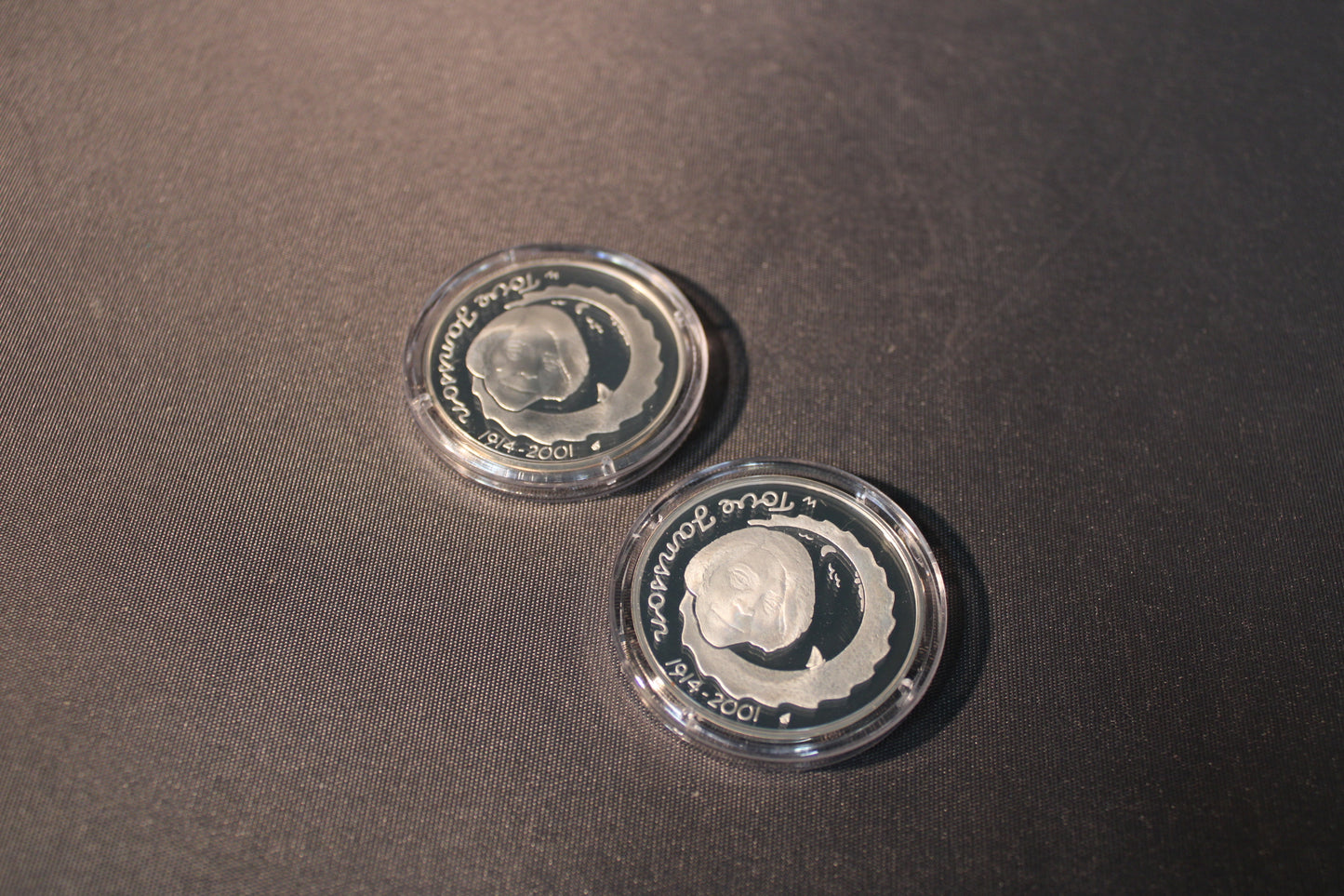 Muumi-aiheiset hopeamitalit