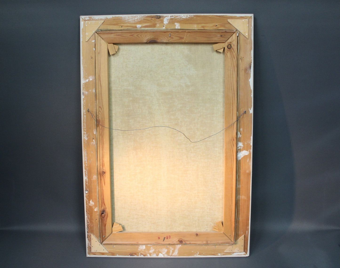 Onkipojat-taulun takaosa ja ripustuslanka