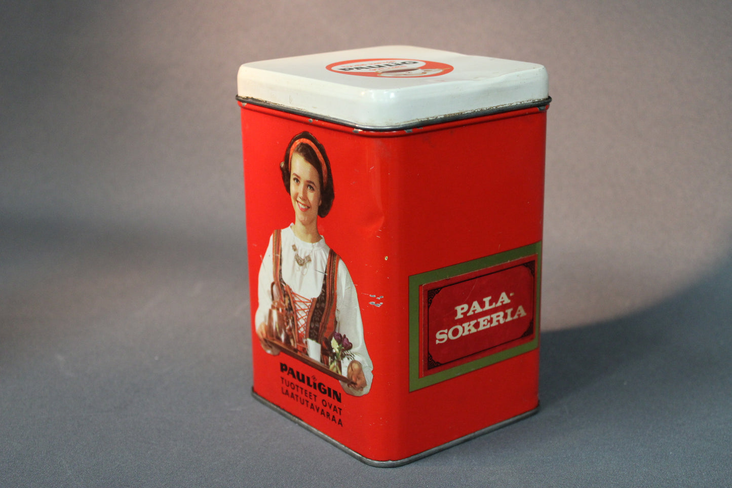 Pauligin retro peltipurkki, pala-sokeria-teksti ja sivukuva