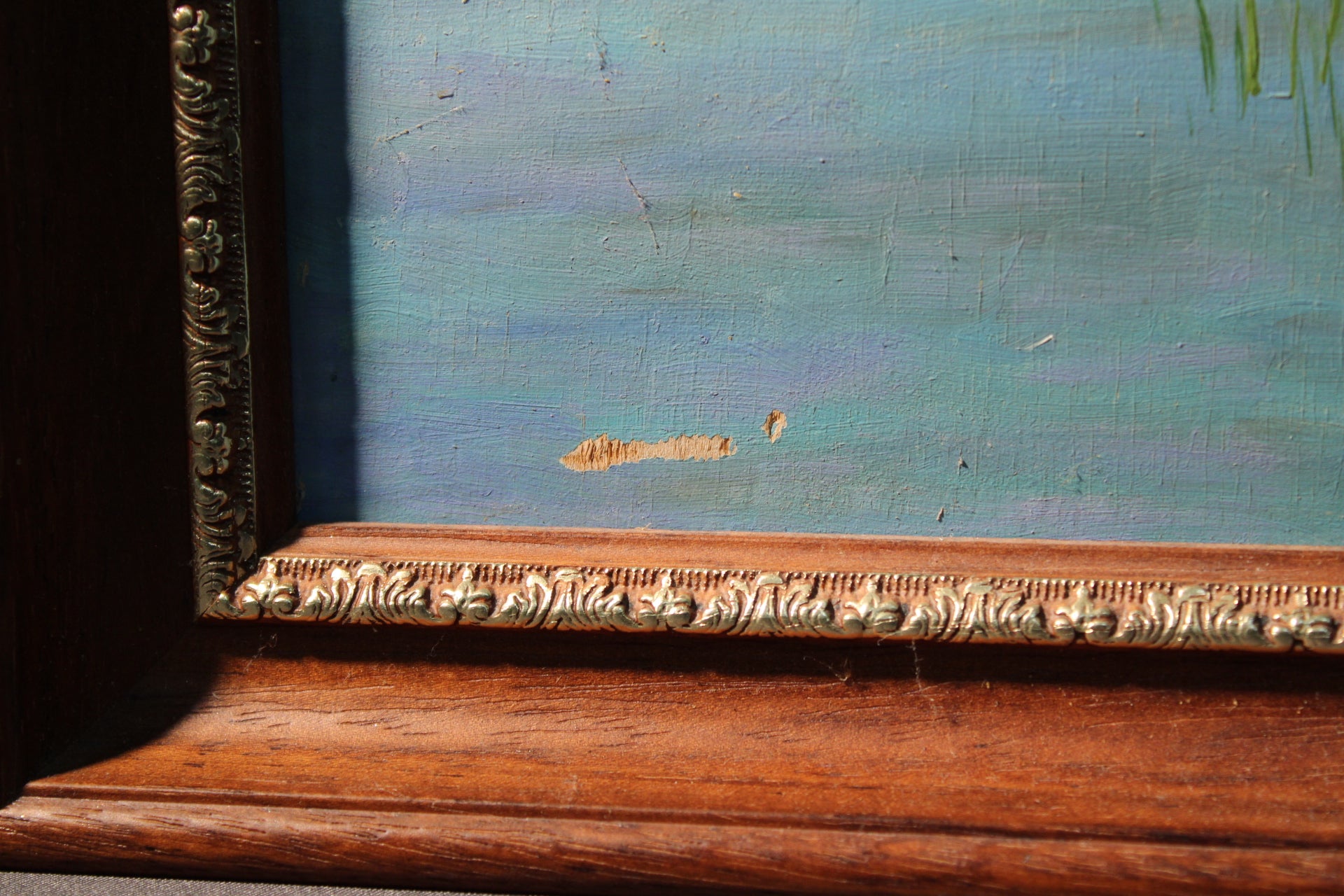 Öljymaalauksen yksityiskohta, kuluma maalipinnassa, suomalainen järvimaisema